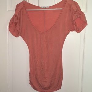 Cute mango colored tee with wonderful detail
